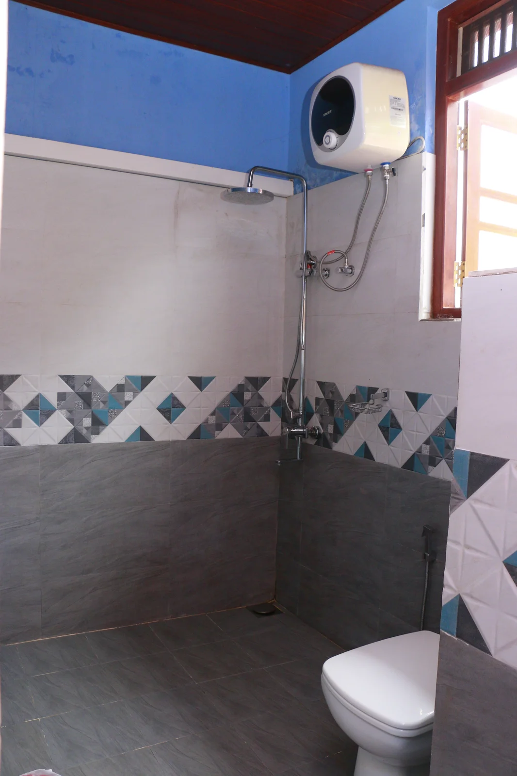 Deluxe Triple Room — Photo 5