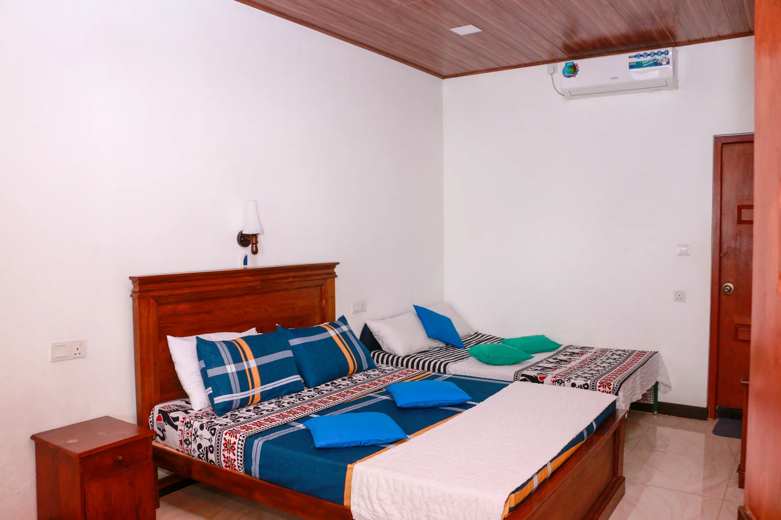 Deluxe Triple Room — Photo 11