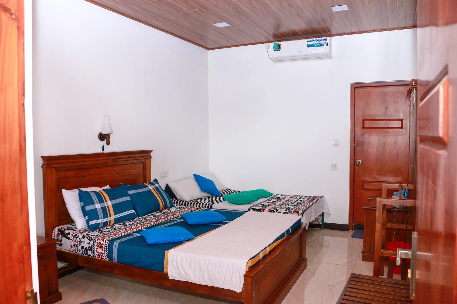 Deluxe Triple Room — Photo 12